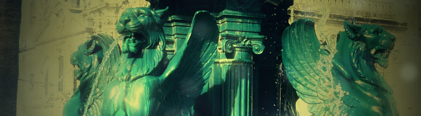 Photographie d'une fontaine à Porto. La fontaine est ornée de griffons bleus crachant de l'eau.